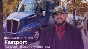 Image of Fastport Transition Trucking Winner, Corey Troxell smiling with text reading "Fastport: Transition Trucking Winner 2024"